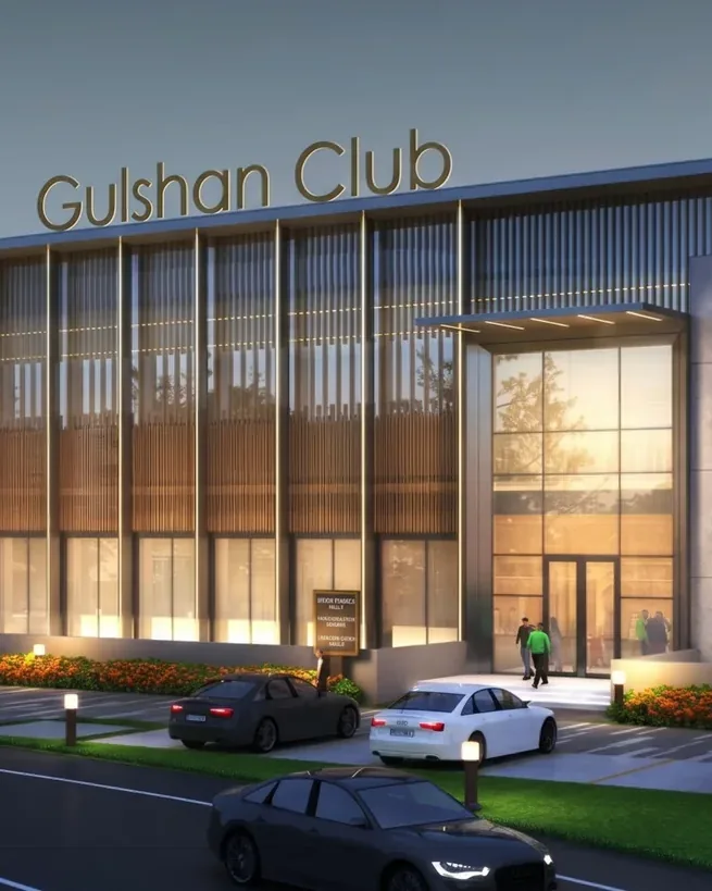Gulshan Club signage and lit entrance at dusk — Gulshan Empire, Wave City (builder render, artistic visualization)